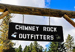 Chimney Rock Outfitters hunt camp sign